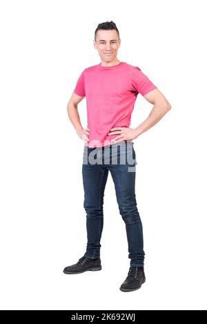 Cheerful man standing in studio. White background Stock Photo
