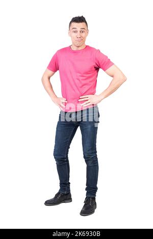 Confident man smirking in studio. White background Stock Photo
