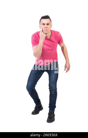 Serious man looking at camera. White background Stock Photo