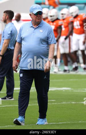 North Carolina Tar Heels head coach Mack Brown watches his team before the game at Hard Rock Stadium on October 8, 2022 in Miami Gardens, FL.  North Carolina Tar Heels defeated Miami Hurricanes 27-24 (Credit: Paul Fong/Image of Sport) Stock Photo