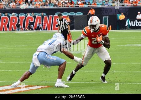 Running Mario Icon MIAMI GARDENS - OCTOBER 24: Miami defensive back Camdin Portis (21 ...