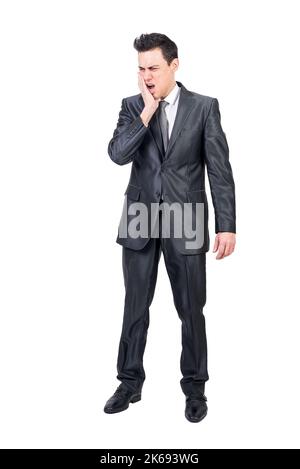 Man in suit suffering from toothache. White background. Stock Photo