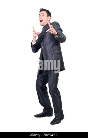 Cheerful businessman pointing at camera. White background. Stock Photo