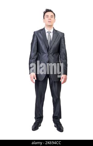 Shocked businessman in suit in studio. White background. Stock Photo