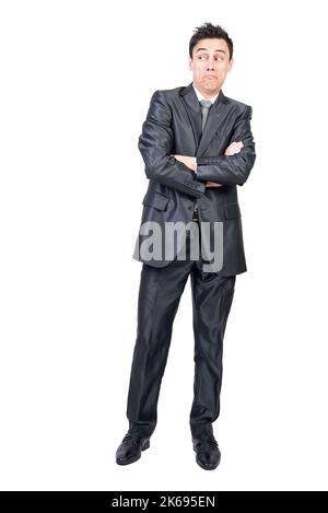 Positive young businessman in suit looking away surprised face Stock Photo