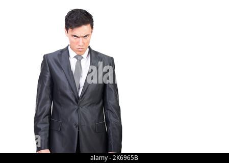 Angry man in formal suit feeling dissatisfied Stock Photo