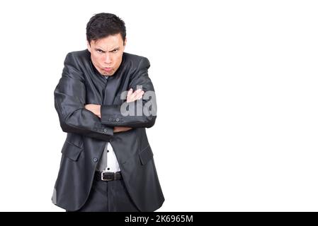 Childish angry man folding hands and shrugging shoulders Stock Photo