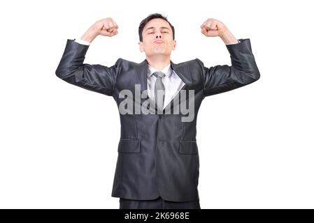 Well dressed man in suit raising fists and showing muscles Stock Photo