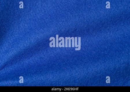 Blue hue color felt textile fabric texture background. Abstract geometric wave background Stock Photo