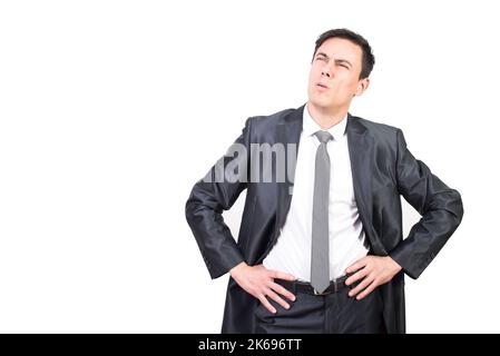 Concentrated male squinting while thinking over problem Stock Photo
