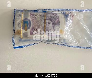 BEST QUALITY AVAILABLE Undated handout photo issued by Metropolitan Police of money seized during a week of action against county lines. Issue date: Thursday October 13, 2022. Stock Photo
