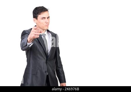 Positive handsome businessman in suit pointing at camera Stock Photo