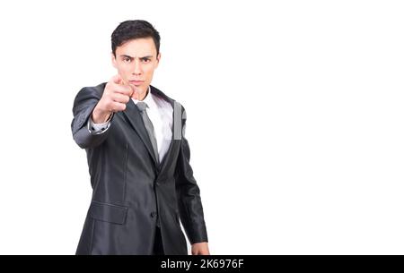 Serious confident businessman in classy outfit pointing at camera Stock Photo