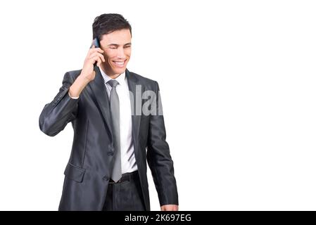 Cheerful man in suit talking on phone Stock Photo