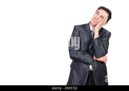 Dreamy man in formal suit touching face Stock Photo