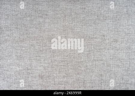Texture of natural gray upholstery fabric or cloth. Fabric texture of natural cotton or linen textile material. Blue canvas background. Decorative fab Stock Photo