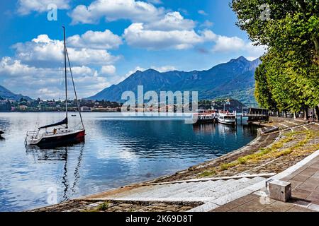 The harbour in Lecco on Lake Como, Italy with the Alps in the background. Stock Photo