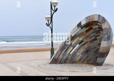 Zarautz, Spain - 19 March, 2022: Sculpture 'Joan Etorrian' on the beachfront promenade in the town of Zarautz, Basque Country Stock Photo