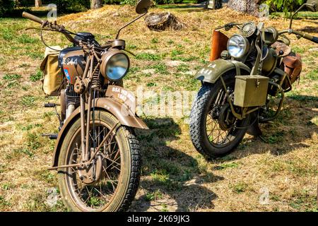 28 august 2022 Villa Varda Brugnera Italy: Military-historical reconstruction of the First World war. exhibition of two vintage motorcycle military ve Stock Photo