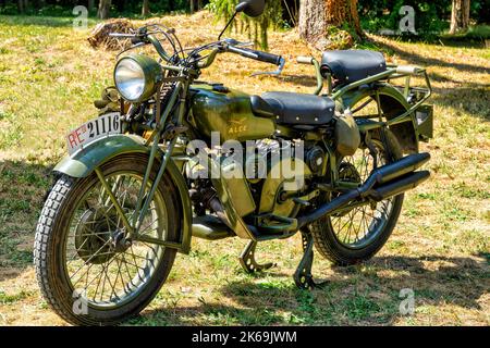 28 august 2022 Villa Varda Brugnera Italy: Military-historical reconstruction of the First World war. exhibition of vintage italian motorcycle militar Stock Photo