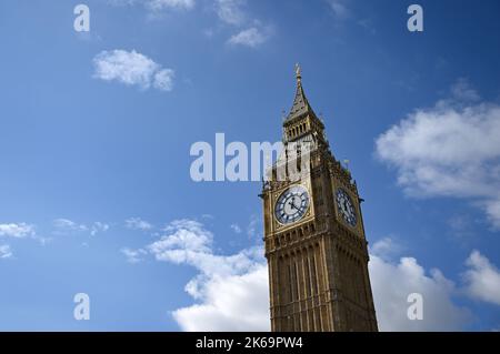 London, UK. 12th Oct, 2022. Clouds pass over Big Ben in the government district of Westminster. For the first time in five years, the famous chimes of the landmark Big Ben rang out again in London's Westminster government district on October 11. Credit: Arne Dedert/dpa/Alamy Live News Stock Photo