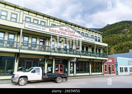 Skagway, Alaska - September 7, 2022: Front facade of the Skagway Brewing Company in Skagway, Alaska.  The brewery dates back to 1897. Stock Photo