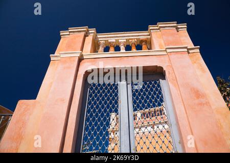 Old gray painted iron gate doors, Oia, Santorini, Greece. Stock Photo