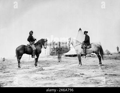 Captain George Armstrong Custer with Major General Alfred Pleasonton on horseback during American Civil War. Stock Photo