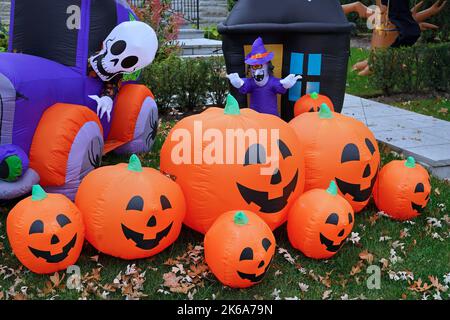 Inflatable Halloween decorations in front yard of home Stock Photo