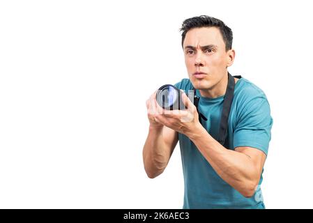 Focused man taking pictures on photo camera Stock Photo