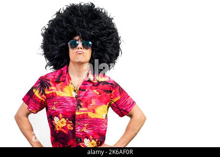 Confident man in Afro wig pouting lips Stock Photo