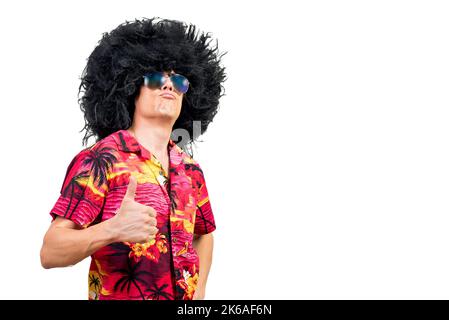 Proud man in funny Afro wig gesturing thumb up Stock Photo
