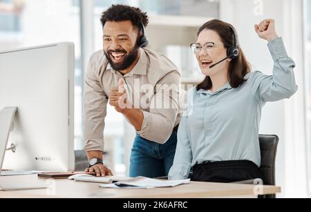Crm customer support success and internet help workers celebration on a online consultation. Happy contact us call center employees working and Stock Photo