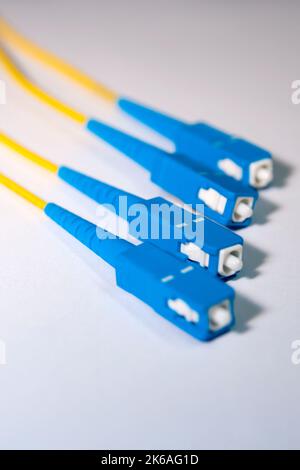 Fiber optic SC connector on white background Stock Photo