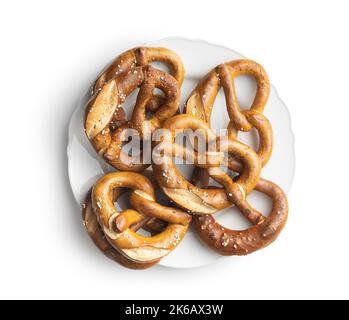 Baked bavarian pretzels isolated on the white background. Stock Photo