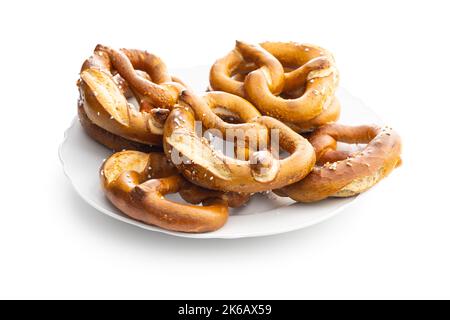 Baked bavarian pretzels isolated on the white background. Stock Photo