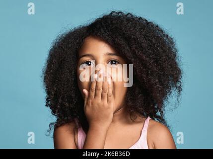 Excited kids face. Amazed expression, cheerful and glad. Amazed child with  open mouth on yellow background, surprise Stock Photo - Alamy