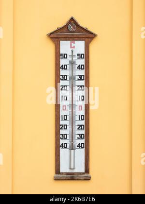 Moscow, Russia - May 22, 2019. Outdoor thermometer on the facade of the Grand Kremlin Palace Stock Photo