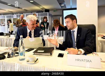 Prague, Czech Republic. 13th Oct, 2022. German State Secretary of Federal Ministry of Labour and Social Affairs Rolf Schmachtenberg, left, and Croatian Minister of Labour, Pension System, Family and Social Policy Ivan Vidis during the informal meeting of EU ministers for labour and social affairs held within Czech EU presidency in Prague, Czech Republic, October 13, 2022. Credit: Katerina Sulova/CTK Photo/Alamy Live News Stock Photo