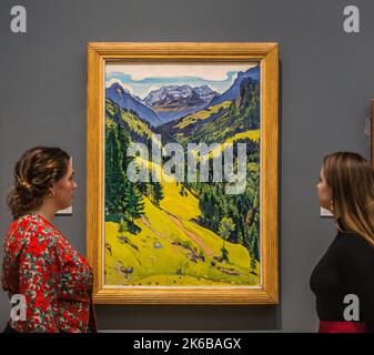 London UK 13 Oct 2022 Celebrating the new acquisition and display of the The Kien Valley with the Bluemlisalp massif, the first painting by Swiss artist Ferdinand Hodler in an English public collection. A reminder during Frieze Week of the permanent collections freely available in London all year round showcasing innovative and breathtaking painting, Hodler chose an aggressively vertical format for this landscape, exaggerating the steep peaks and the interlacing of the foothills, with its intense colours. Paul Quezada-Neiman/Alamy Live News Stock Photo