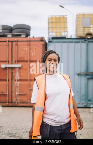 Portrait of happy construction worker standing at site Stock Photo