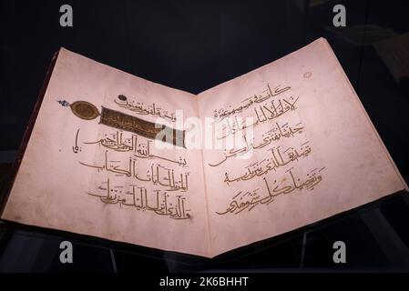 Istanbul, Turkey - 27 -09-2022 : Old book written in Arabic in the Turkish Islamic Civilizations Museum Stock Photo