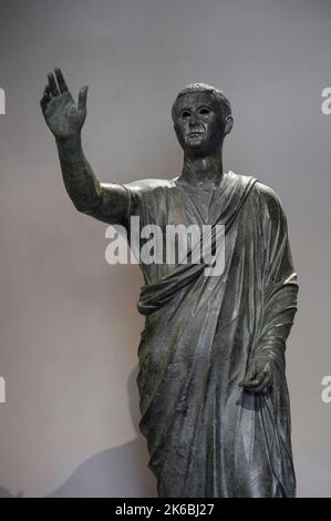 Florence. Italy. Bronze statue of the Arringatore 'The Orator', from Sanguineto (Perugia), end of 2nd - early 1st century BCE. The statue depicts the Stock Photo