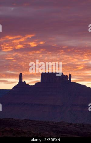 Colorful sunset clouds over the Castleton Tower / Castle Rock, the Rectory and Priest and Nuns near Moab, Utah. Stock Photo