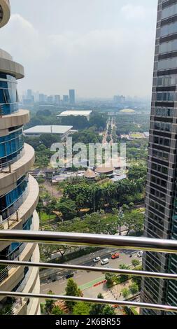 Jakarta business and finance district cityscape on sunny day with buildings and clouds in sky background. No people. Stock Photo