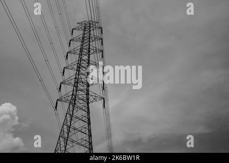 Monochrome photo, view of signal tower and electricity distribution tower, Cikancung - Indonesia Stock Photo