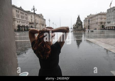 Rainy afternoon in Unity of Italy Square (Piazza Unita d' Italia). Trieste, Italy Stock Photo