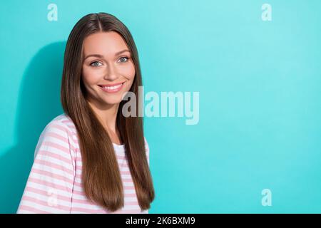Photo of pretty satisfied nice girl with straight hairdo dressed striped t-shirt toothy smiling isolated on turquoise color background Stock Photo