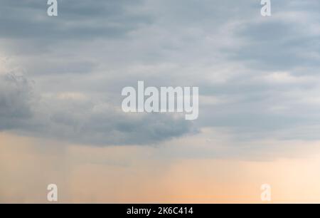 Dramatic Sky Background. Panoramic view of Stormy Clouds in Dark sky Stock Photo