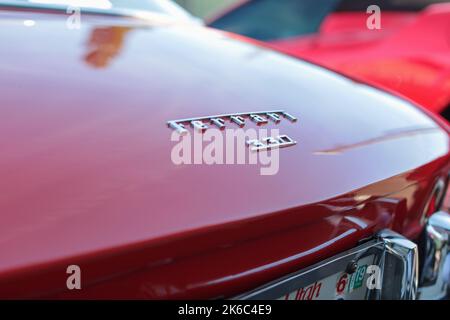 A closeup of a red 1965 Ferrari 330 rear logo Stock Photo - Alamy